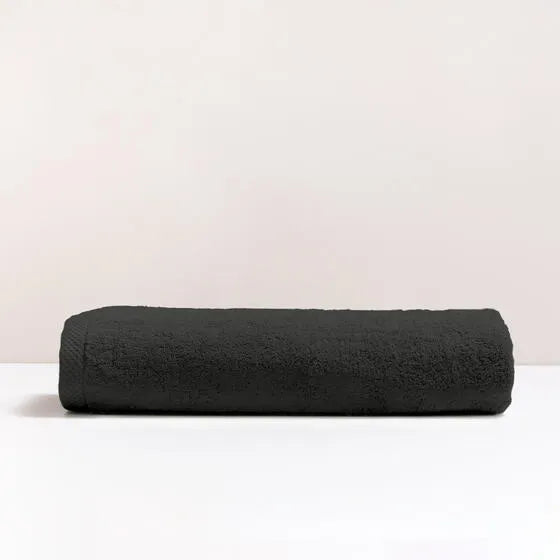 Luxe antraciet Florence maxi badhanddoek van 100% GOTS-katoen, 600 g/m², hoge kwaliteit, zacht en absorberend.